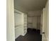 Large walk-in closet with custom shelves and metal rods at 4034 Daugherty Rd, China Grove, NC 28023
