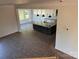Open-concept kitchen with granite island, pendant lighting, and stainless steel appliances, perfect for entertaining at 4040 Daugherty Rd, China Grove, NC 28023