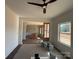 Living room features hard wood floors, tray ceiling, access to outdoors and open floor plan at 4040 Daugherty Rd, China Grove, NC 28023