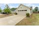 This home features a two car garage and long driveway at 4219 Mackinnon Dr, Charlotte, NC 28214