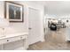 Inviting hallway leads to an open-concept living space with modern flooring and neutral tones at 4219 Mackinnon Dr, Charlotte, NC 28214
