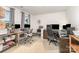 Versatile home office space with multiple desks, ergonomic chairs, and ample natural light for productivity at 4219 Mackinnon Dr, Charlotte, NC 28214