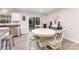 Bright kitchen with a breakfast table and stainless steel appliances at 4219 Mackinnon Dr, Charlotte, NC 28214