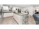 Spacious kitchen with granite countertops, white cabinets, stainless steel appliances, and a central island at 4219 Mackinnon Dr, Charlotte, NC 28214
