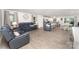 This open-concept living room flows into the kitchen and is great for entertaining at 4219 Mackinnon Dr, Charlotte, NC 28214
