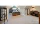 Lofted bedroom featuring sloped ceilings and a cozy bed at 423 N Pine St, Charlotte, NC 28202