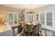 Well-lit dining room with zebra print rug, offering a cozy and stylish ambiance for dining and entertaining at 423 N Pine St, Charlotte, NC 28202