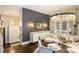 Elegant dining room with decorative wall, modern lighting and setting for six at 423 N Pine St, Charlotte, NC 28202
