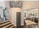 Hallway view of an open-concept home and adajacent kitchen with eat-in space at 423 N Pine St, Charlotte, NC 28202