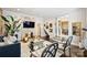 Open-concept living room with sleek fireplace and staircase, offering a modern and inviting atmosphere at 423 N Pine St, Charlotte, NC 28202