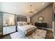 Beautiful bedroom with a plush king bed, stylish lighting, and neutral color palette, creating a serene and inviting atmosphere at 423 N Pine St, Charlotte, NC 28202
