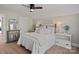 Bedroom with metal bed frame, decorative accents, and a bright airy feel at 5490 Sapwood Ct, Denver, NC 28037