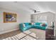Spacious bonus room with vaulted ceilings, a turquoise sofa, and neutral carpeting at 5490 Sapwood Ct, Denver, NC 28037