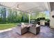 Backyard patio featuring a built-in grill and an outdoor dining area perfect for entertaining Gathering and friends at 5490 Sapwood Ct, Denver, NC 28037