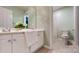 Well-lit bathroom with neutral cabinets, granite counters, and tile flooring at 6100 Hunter Ln, Weddington, NC 28104