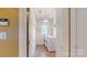 Functional laundry room featuring a washer, dryer, and ample storage space at 6100 Hunter Ln, Weddington, NC 28104