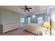 Spacious main bedroom with tray ceiling, natural light, and a private sitting area at 6100 Hunter Ln, Weddington, NC 28104