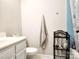 Clean bathroom with a sink, toilet, and tiled shower at 6234 Rosecroft Dr, Charlotte, NC 28215