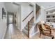 Lovely entryway featuring tile flooring, staircase, and a view of the front door at 639 Lorain Nw Ave, Concord, NC 28027