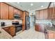 Well-equipped kitchen with stainless steel appliances and lots of cabinets at 639 Lorain Nw Ave, Concord, NC 28027