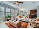 Inviting living room featuring tile flooring, a ceiling fan, and a cozy seating arrangement at 639 Lorain Nw Ave, Concord, NC 28027