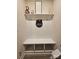 Entryway bench offering seating, storage, and modern aesthetic appeal at 705 Hinterland Ln, Matthews, NC 28104
