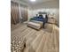 Serene main bedroom features a plush bed, stylish decor, and soft lighting at 705 Hinterland Ln, Matthews, NC 28104