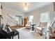 Chic living room with decorative lighting, neutral palette, and inviting ambiance at 7122 Forest Ridge Rd, Matthews, NC 28104