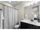 Neutral bathroom offering a shower-tub combination and a dark vanity, providing a functional and well-lit space at 733 Lingfield Ln, Waxhaw, NC 28173