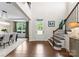 Grand foyer with hardwood floors, staircase, high ceilings, natural light and views of the dining room at 733 Lingfield Ln, Waxhaw, NC 28173