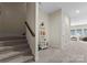 Hallway showing carpeted stairs and an open view into the living space at 733 Lingfield Ln, Waxhaw, NC 28173