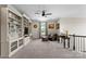 Inviting living room featuring custom built-ins, plush seating, and a cozy atmosphere with natural light at 733 Lingfield Ln, Waxhaw, NC 28173