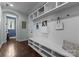 Well-organized mud room with custom shelving and seating, perfect for keeping the entryway tidy and welcoming at 733 Lingfield Ln, Waxhaw, NC 28173