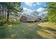 Beautifully maintained backyard with green grass and a wooden fence, offering privacy and charm at 8222 Henry Harris Rd, Fort Mill, SC 29707