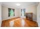 Bright bedroom features hardwood floors, natural light, and classic molding at 8222 Henry Harris Rd, Fort Mill, SC 29707