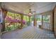 Inviting screened-in porch with outdoor views and natural light, perfect for relaxation at 8222 Henry Harris Rd, Fort Mill, SC 29707