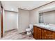 Well-lit bathroom features a spacious vanity with a granite countertop and a modern toilet at 850 Deep Hollow Ct, Clover, SC 29710