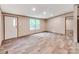 Bright living room featuring laminate wood floors, natural light, and neutral color palette at 850 Deep Hollow Ct, Clover, SC 29710