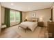 Comfortable main bedroom featuring bright natural light and neutral decor and carpet at 850 Deep Hollow Ct, Clover, SC 29710