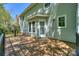 Back deck featuring house with light-green siding and access to the home's interior at 8709 Stratton Farm Rd, Huntersville, NC 28078