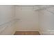 Spacious walk-in closet featuring wire shelving and ample room for storage at 8709 Stratton Farm Rd, Huntersville, NC 28078