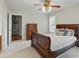 Spacious bedroom with a ceiling fan and ample natural light at 105 Horsestable Ct, Mooresville, NC 28115