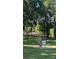 Willow Valley Park sign with a well-maintained green lawn and mature trees at 105 Nighthawk Trl # 20, Mooresville, NC 28115