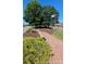 Community view with a sidewalk leading to the American flag and the monument at 105 Nighthawk Trl # 20, Mooresville, NC 28115
