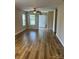 Spacious living room with new wood flooring and plenty of natural light at 1156 Fowler Brook Ct, Indian Land, SC 29707