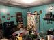 Spacious kitchen featuring vintage appliances, colorful decor, and an adjacent dining area at 1210 Congress St, Gastonia, NC 28054