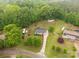 Overhead shot of the home on a generous lot surrounded by lush greenery at 1215 Eastcreek Rd, Fort Lawn, SC 29714