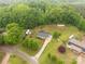 Beautiful aerial view of the property showcasing the home, greenery, and serene surroundings at 1215 Eastcreek Rd, Fort Lawn, SC 29714