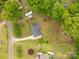 This property features a well-maintained lawn with mature trees, offering a serene and private setting at 1215 Eastcreek Rd, Fort Lawn, SC 29714