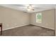Spacious bedroom featuring wall to wall carpeting and a ceiling fan at 1215 Eastcreek Rd, Fort Lawn, SC 29714